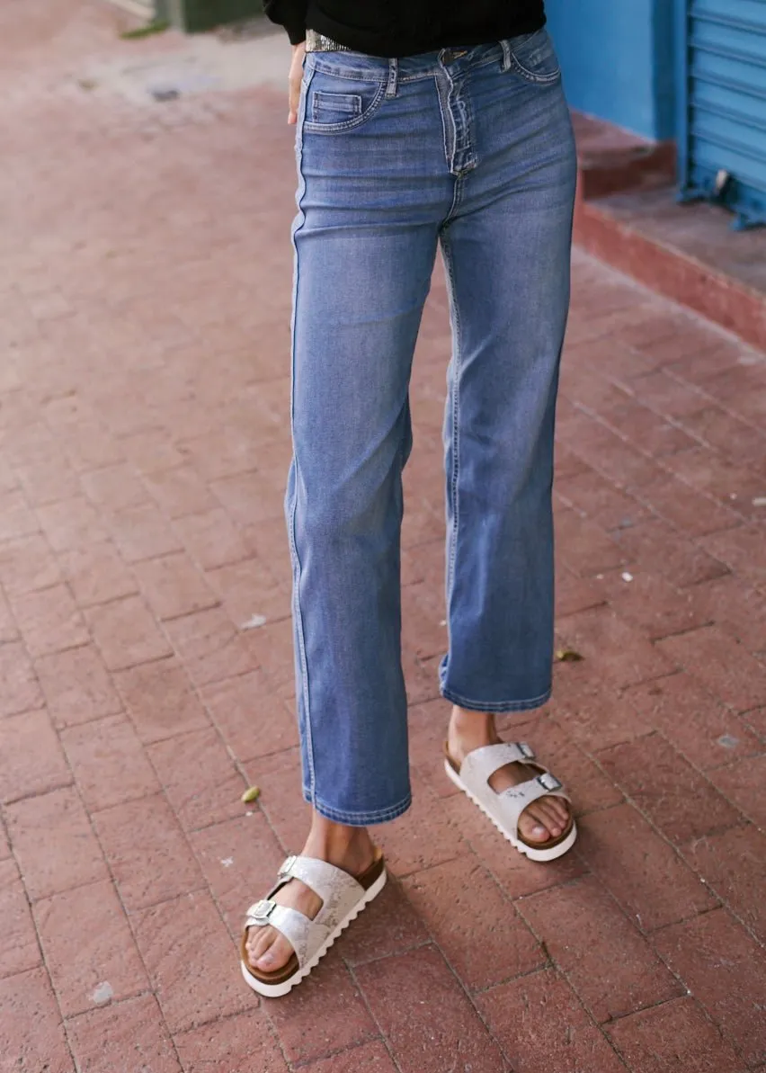 Flared and Cropped Reversible Jeans with Floral Print In Denim